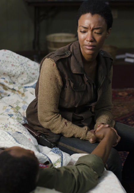 The scenes between Sasha (Sonequa Martin-Green) and Bob (Lawrence Gilliard Jr.) are among the most heartbreaking that The Walking Dead has ever featured, a sign that death is still not a casual fact of life for those who choose to hang onto their humanity (image (c) Photo by Gene Page/AMC via official AMC TWD page)