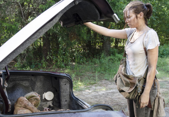 Maggie, already struggling to keep going, finds nothing but a trussed-up walker in the boot of a car instead of the food and water she was clearly hoping for (Photo by Gene Page/AMC)