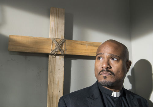 Weighed down by the weight of the world, Father Gabriel spent the episode the latest in a long line of world weary facial expressions, all the rage among the apocalyptically self-pitying coward crowd (Photo by Gene Page/AMC)