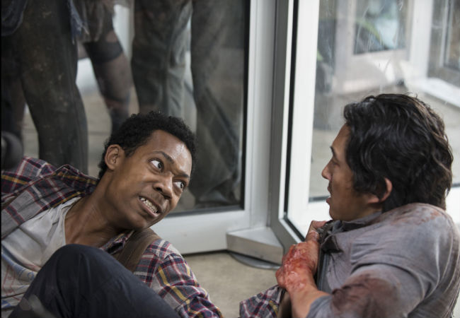 "I told you Glenn, revolving doors are scary motherf**kers! Why did we use the revolving door Glenn why?" Noah and Glenn discover they may have used entirely the wrong exit (Photo by Gene Page/AMC)