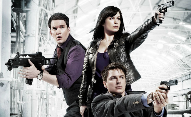 Ianto Jones (Gareth David-Lloyd), Gwen Cooper (Eve Myles) and Captain Jack (John Barrowman) face off against threats from within Earth and without once more (image via Den of Geek (c) BBC)