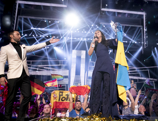 Winner of the Eurovision Song Contest 2015 and this year's co-host Måns Zelmerlöw presents an understandably thrilled Jamala from Ukraine as the winner of this year's event (photo (c) Andres Putting EBU)