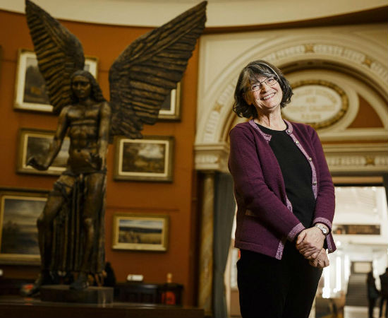 Author Clare Morrall stands in the Birmingham Museum & Art Gallery next to the statue of Lucifer, a place that Roza, the voice of the novel often visits against all the rules saying the city centre is no go area (image via Independent (c) Andrew Fox)