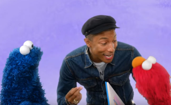 Pharrell Williams, Cookie Monster and Elmo go to the most extraordinary places ... all without leaving Sesame Street (image via YouTube (c) Sesame Workshop) 