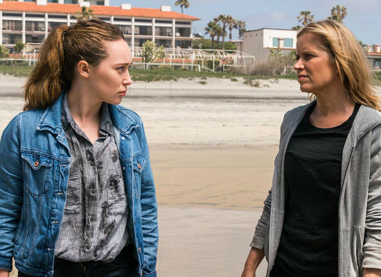 There's nothing like mother-daughter bonding and righting of past wrongs while standing in the swirling surf plotting the watery demise of a mass of zombies (photo courtesy AMC)